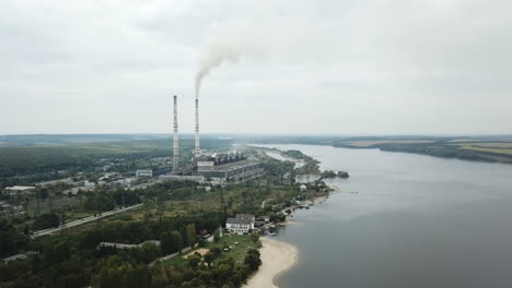 aerial shot of the heating plants over the river