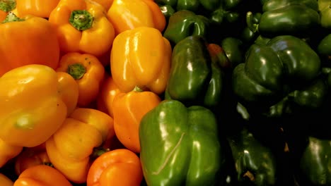 bell peppers transitioning from yellow to red