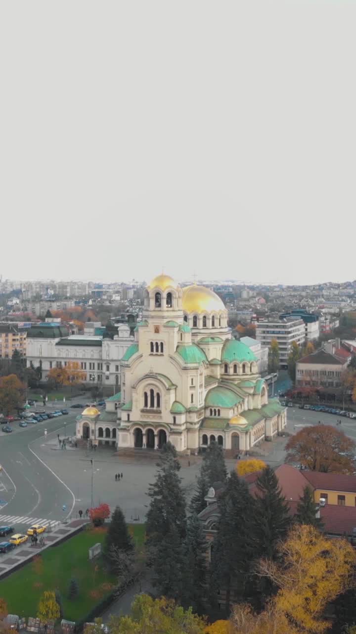 Aerial view of St. Alexander Nevsky Cathedral, a landmark in Sofia, Bulgaria. Vertical Video, Push Forward Shot