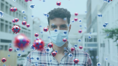 animation of covid 19 virus cells over man wearing face mask