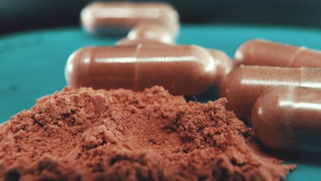 a macro shot in a lab of a medical capsules falling near the brown powder, organic pills, studio light, 4k video