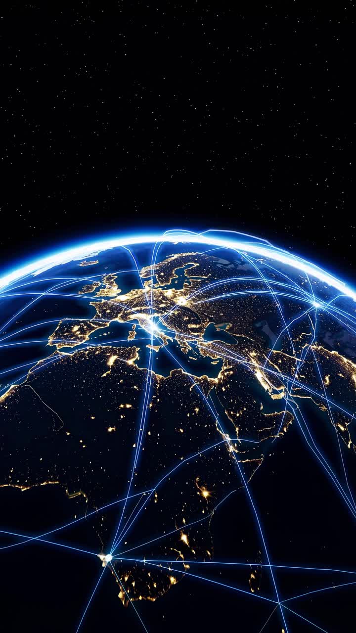 Aerial video concept of Earth at night with glowing city lights and digital network lines, viewed