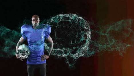 animation of digital brain spinning over male american football player holding helmet