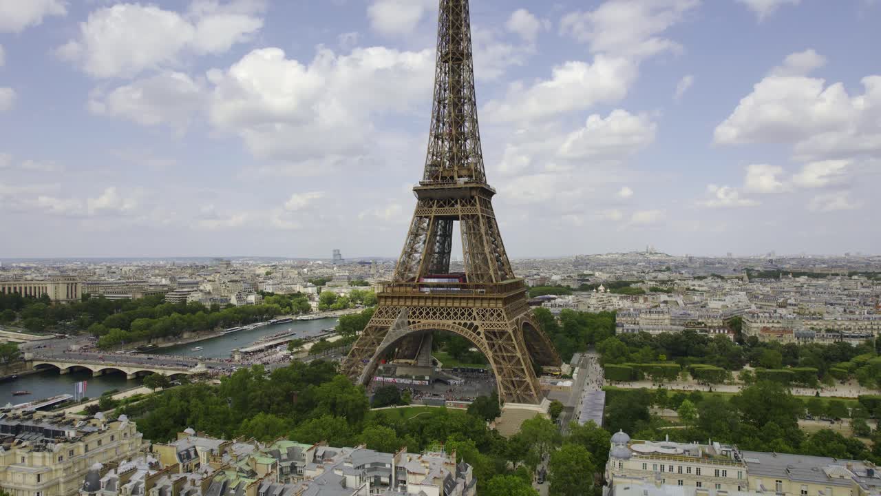Aerial view of the Eiffel Tower and Paris cityscape with Seine River