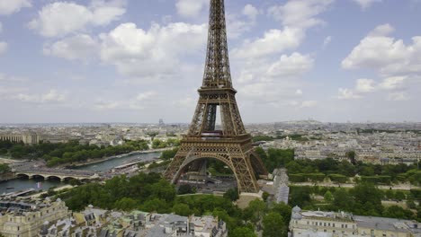 aerial view of the eiffel tower and paris cityscape with seine river