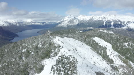 AERIAL---Snowy-Andes-Mountains,-Cerro-Otto,-Patagonia,-Argentina,-forward-circle-pan