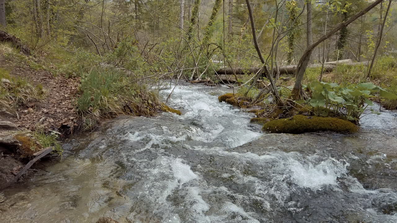 Fast flowing water and waterfalls of the Plitvice National park in Croatia
