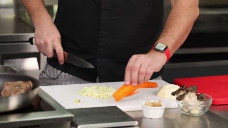 chef preparing vegetables for a meal