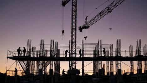 construction site silhouette at sunset