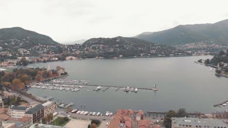 Yachts-and-boats-moored-at-Lake-Como-marina,-Lombardy