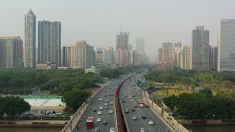 sunny evening guangzhou city pearl river traffic bridge aerial panorama 4k china