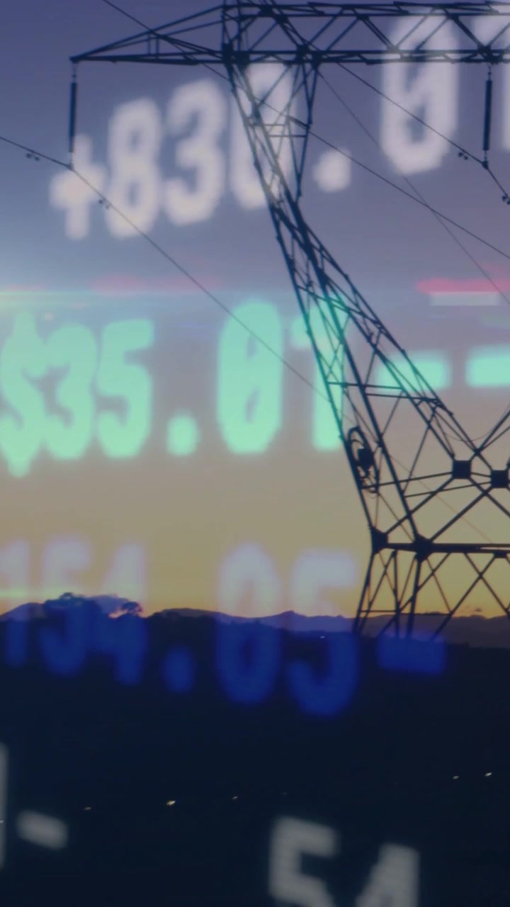Video vertical: Panorámica que revela un pilón, con un marcador numérico desplazándose por la torre para mostrar precios de energía.