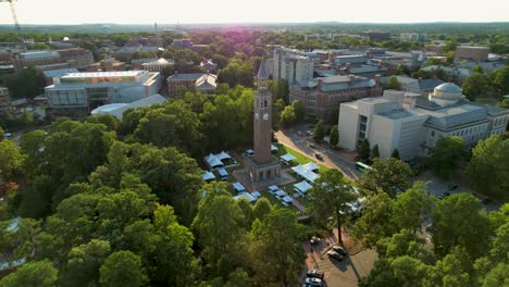 UNC clock tower drone flyover North Carolina Chapel Hill late summer afternoon