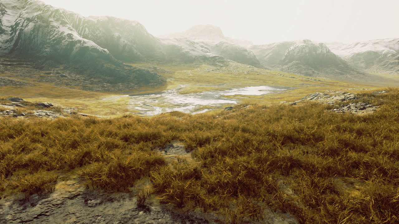 Breathtaking panoramic view of a rugged mountain landscape bathed in sunlight