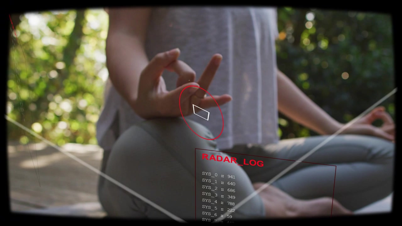 Female yogi sitting on deck, HUD RADAR_LOG reticle appearing and tracking fingertip for health tech