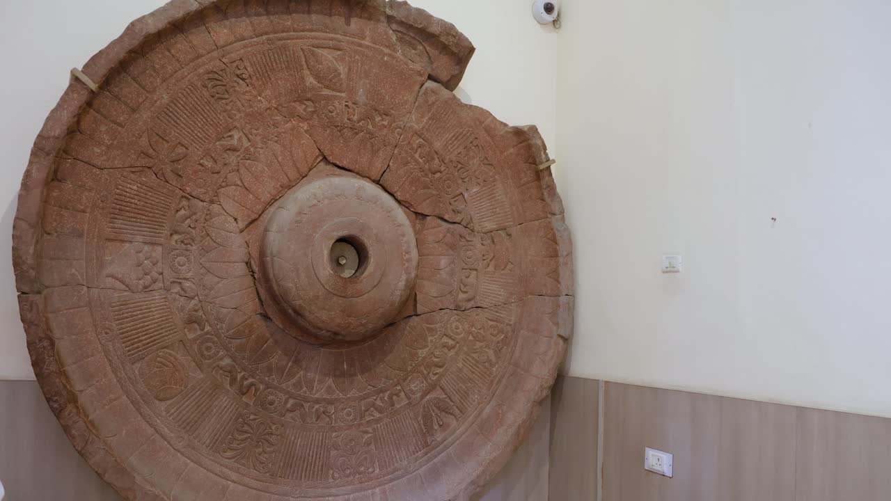holy ruins of ancient stone umbrella at indoor