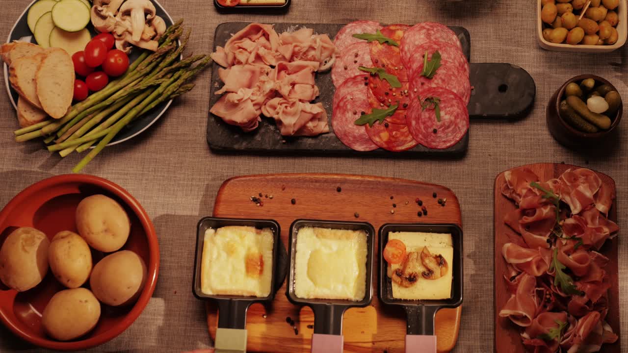 Italian or Spanish restaurant with traditional tapas food, Spanish cuisine, delicious tapas and cheese plate, bruschetta with cheese, olives dry tomatoes and tasty sandwich bar appetizer, buffet