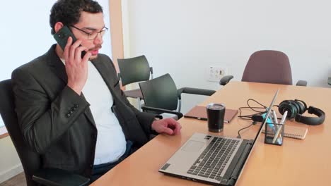 entrepreneur at work: focused side profile