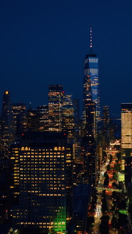 stunning new york scenery at night. drone footage rising above the cityscape with billions of lights.