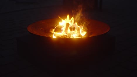 Close-up-of-fire-bowl-outdoors-with-radiant-flames-dancing-in-harmony