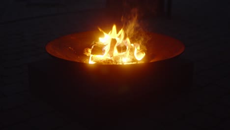 close up of fire bowl outdoors with radiant flames dancing in harmony