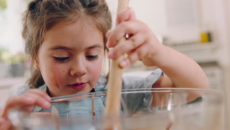 Young-girl-in-kitchen,-baking