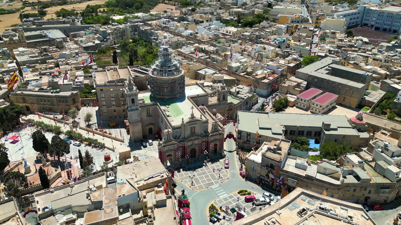 Aerial drone view of the walled city of Valletta, Malta, surrounded by the Mediterranean sea in daylight
