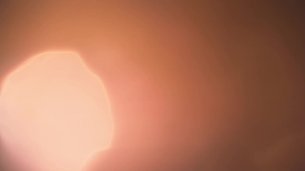Abstract Warm Orange Light Leak Overlay