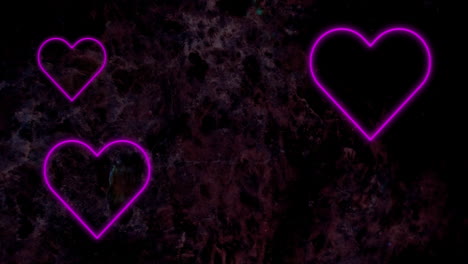 animación de corazones de neón rosado que parpadean sobre un fondo oscuro de flores de cerezo