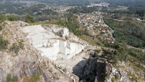 Aerial-drone-panoramic-view-of-a-traditional-granite-quarry-in-Porriño,-Galicia