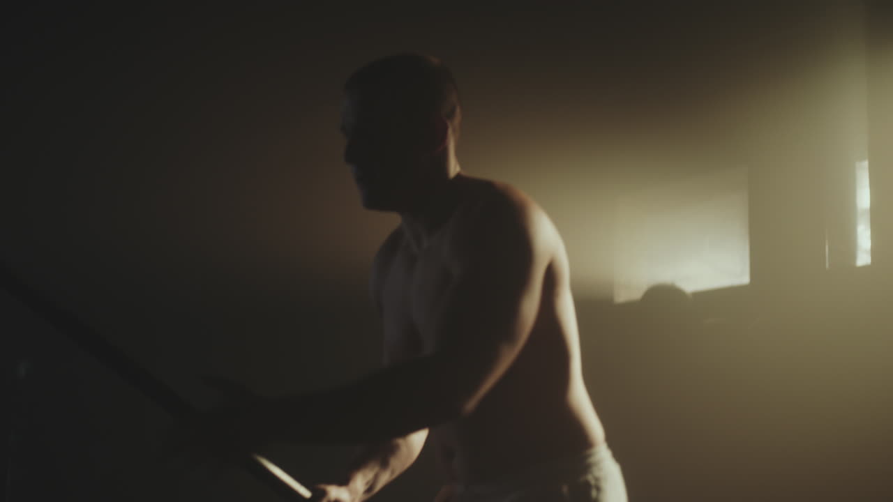 Man working out with pole