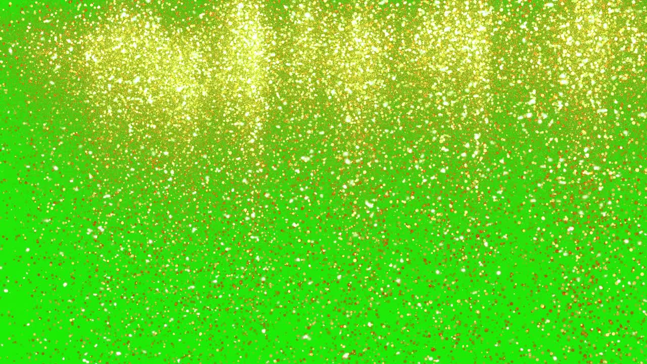 lluvia de polvo de brillo dorado. partículas de polvo dorado festivo en la pantalla verde clave