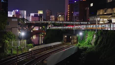 4k multiple tokyo trains departing ochanomizu station towards akihabara at night