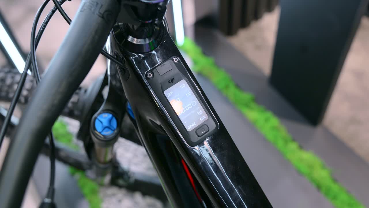 Close-up of a DJI Avinox control panel on a bike frame showcased at IFA Berlin, highlighting cutting-edge technology and digital trends in cycling innovation.
