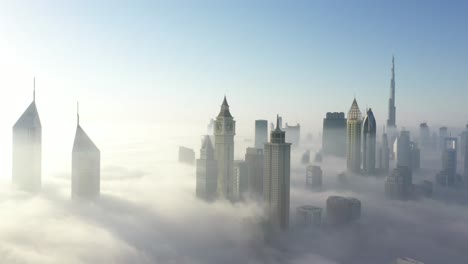 dubai city under a could of heavy fog
