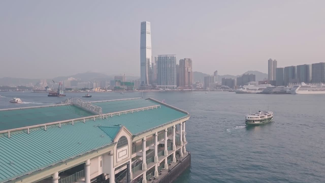 Hong Kong star ferry, central terminal and harbour front. Aerial drone view