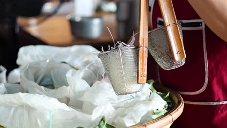 person skillfully stretching handmade noodles