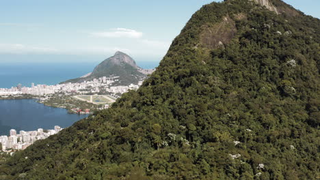 flying the corcovado hill in rio de janeiro with rodrigo de freitas lagoon in the background