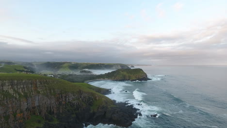 cinematic aerial footage of coffee bay in south africa at sunrise