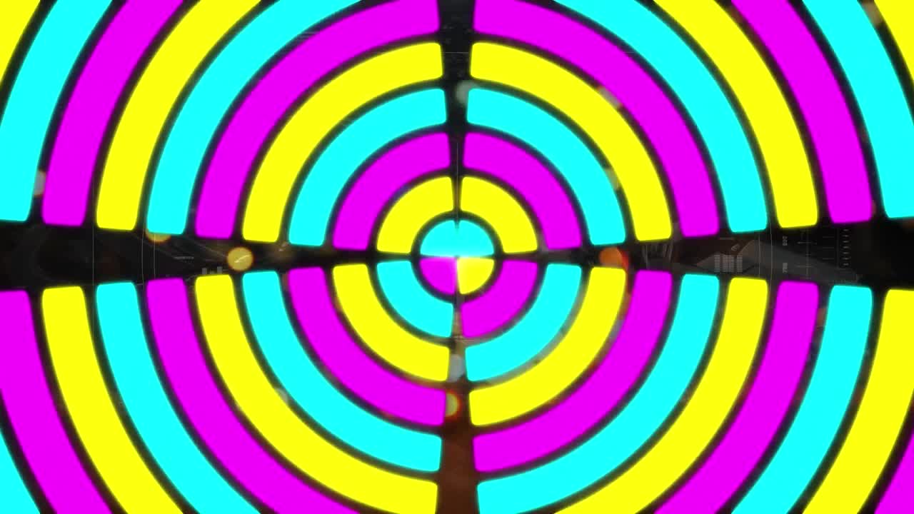 animación de círculos coloridos que se mueven sobre el paisaje urbano nocturno borroso