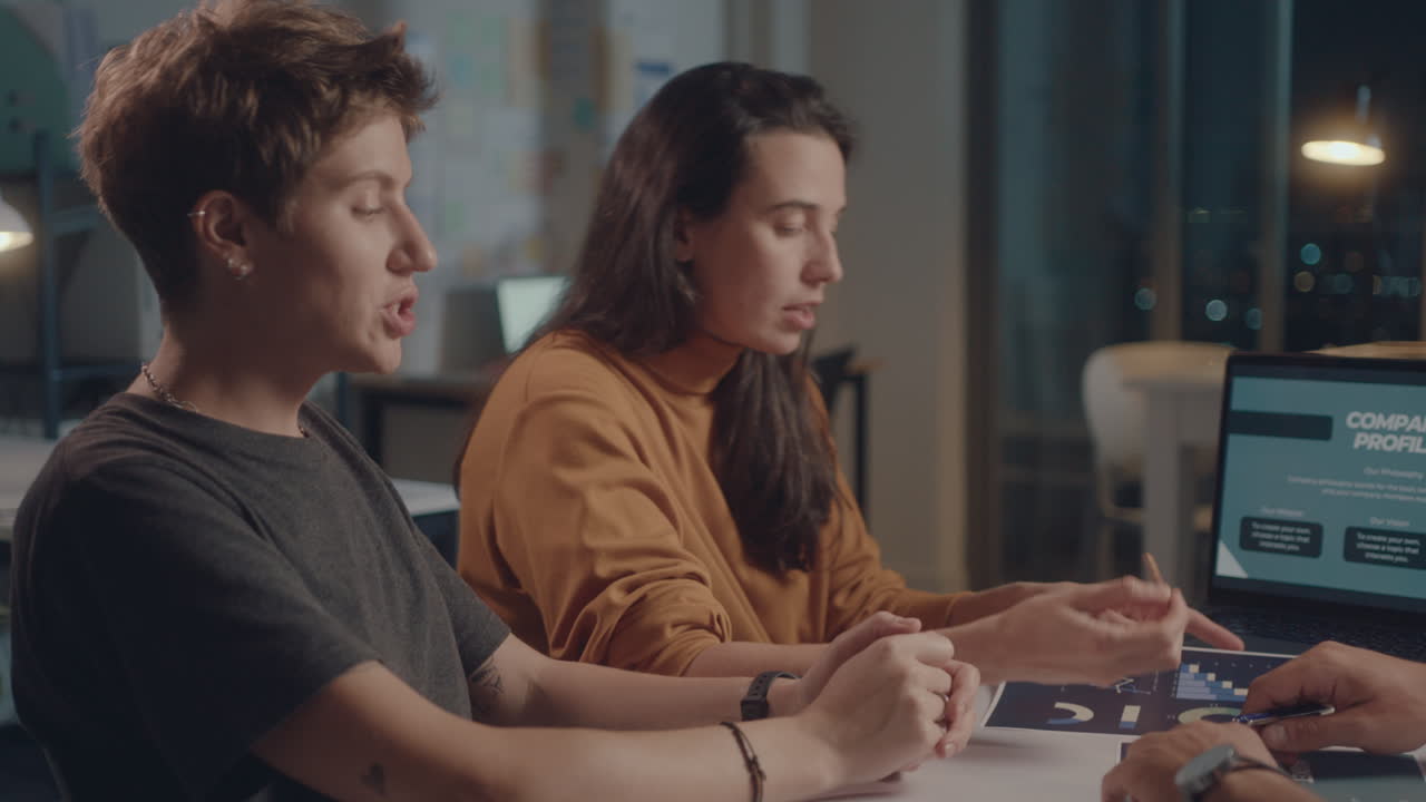 Business Team Having Meeting in the Office during Night Time