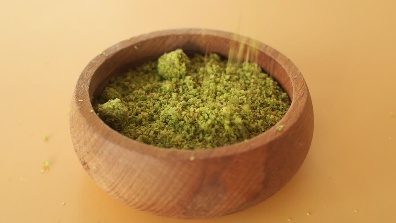 Pistachio Powder in Wooden Bowl