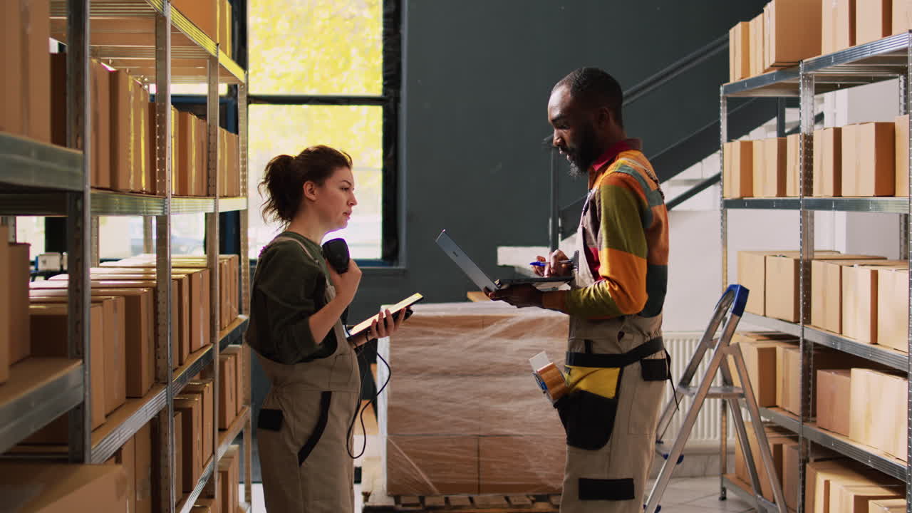 Warehouse employees checking stock