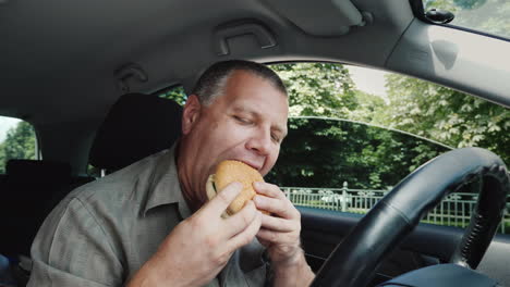 The-Driver-Eats-Fast-Food-Inside-The-Car