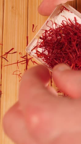 placing saffron threads into box