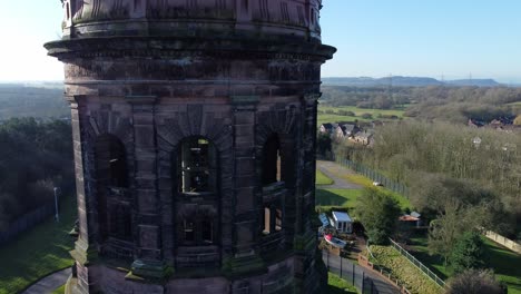 Aerial-view-National-trust-Norton-water-tower-landmark-Runcorn-England-rural-countryside-pull-back-close-rising