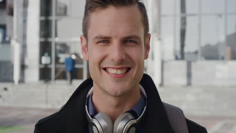 close-up-portrait-attractive-young-businessman-smiling-enjoying-career-success-in-city-happy-male-entrepreneur-successful-urban-lifestyle-slow-motion