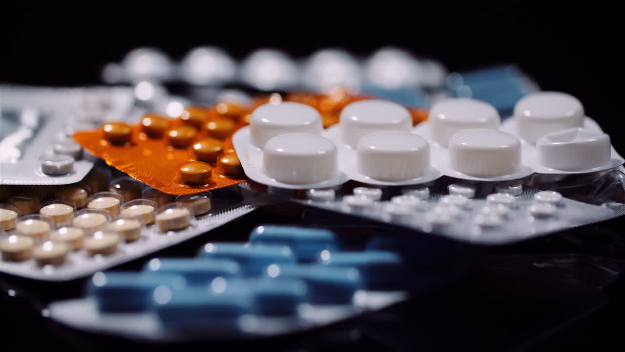 Various Medical Pills Drugs Black Background Pharmaceutical Industry Painkillers Rotating 1