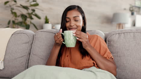 Relax,-coffee-and-Indian-woman-on-couch