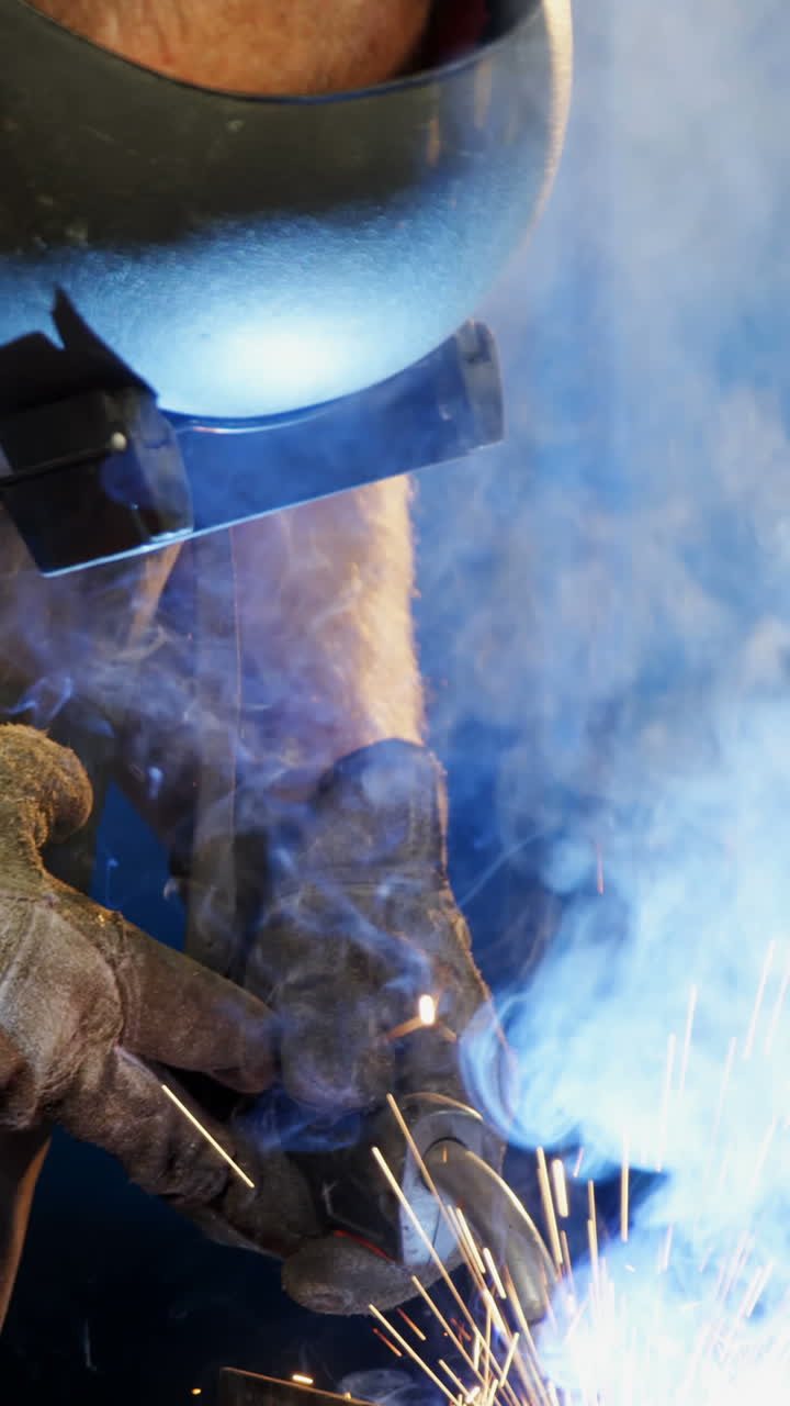 Welder welding a metal